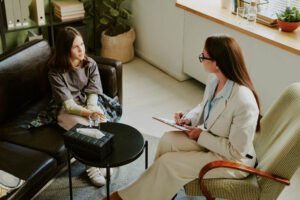 What Is Trauma-Informed Therapeutic Coaching and How Is It Different from Therapy-